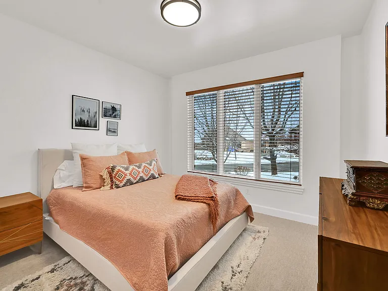 Main floor bedroom with queen bed