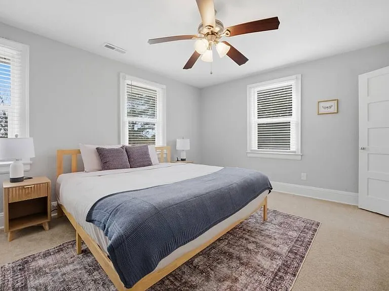 Bedroom 3: Plenty of storage and light in this room with a queen size bed.