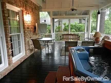Screened porch with hot tub
