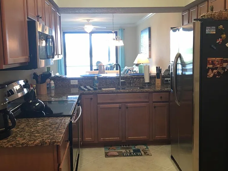 Kitchen has Stainless Everything, Granite, and Maple Cabinet