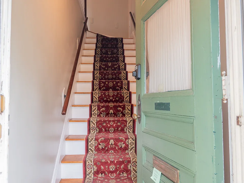 Private entry (front door shown, additional access from rear of building).