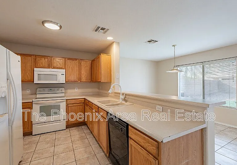 11928 W Columbine Dr — Photo 12