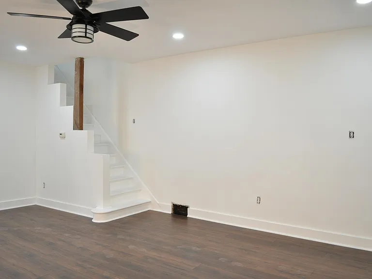 Living area and staircase to 2nd floor bedrooms and bath.