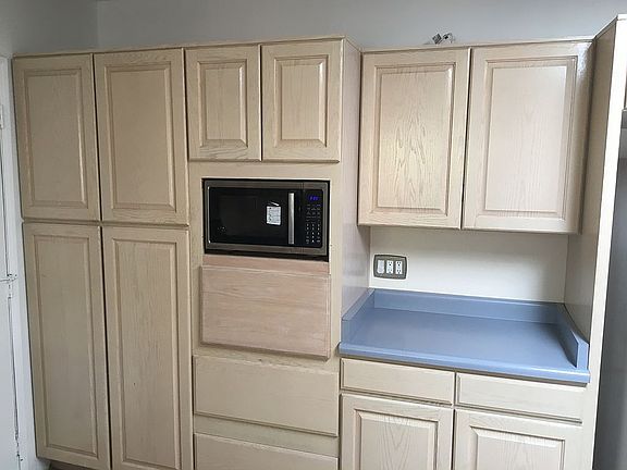 Whitewashed kitchen cabinets