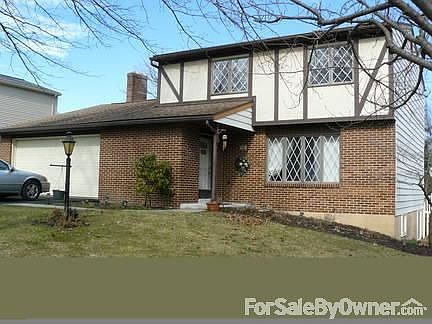 front of house
						:
						in quiet neighborhood, minimal traffic & great services by the township