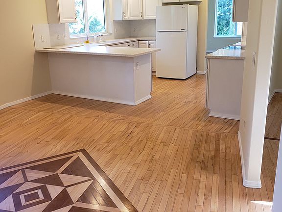 view to kitchen from family room