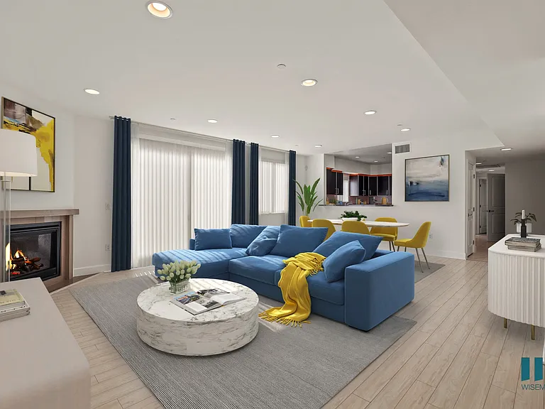 Open-Concept Living Room, Dining, and Kitchen with lots of Windows and Natural Light