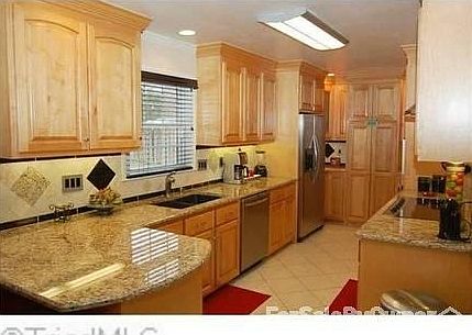 Custom Kitchen
						:
						A Custom Kitchen with Granite Counter Tops