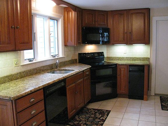 Granite/cherry kitchen