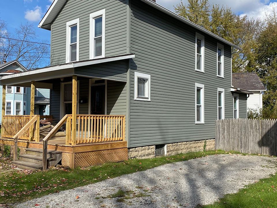 Front exterior with covered front porch and conveniently-located driveway.