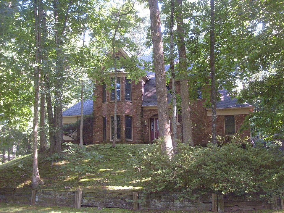 Set on a hill among trees