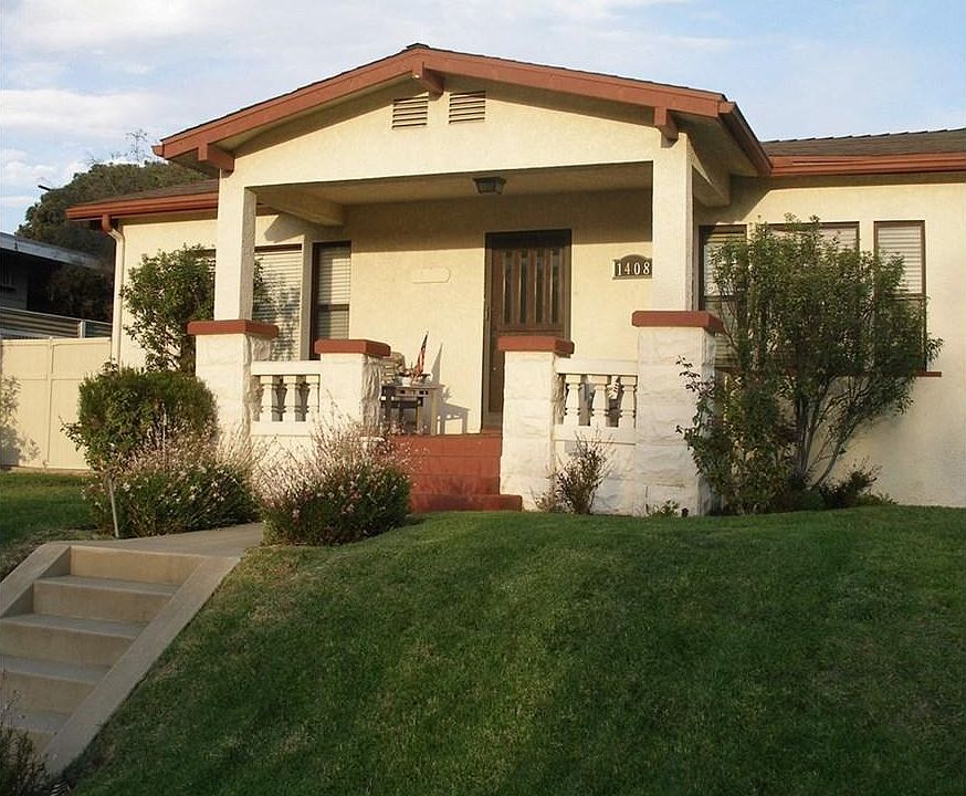 The house sits above the street level for privacy and has a nice front porch to relax. The mail is delivered by the front door.