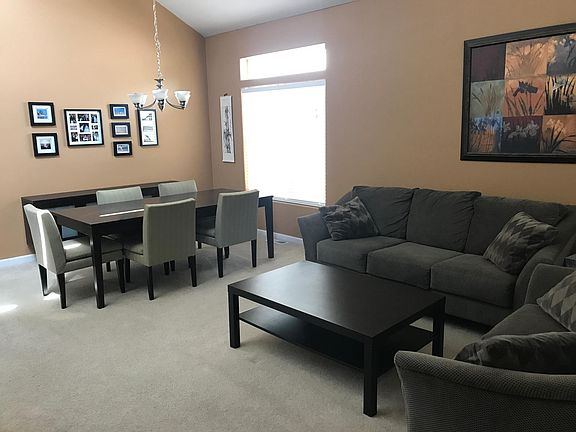 Dining/Living Room with vaulted ceilings
