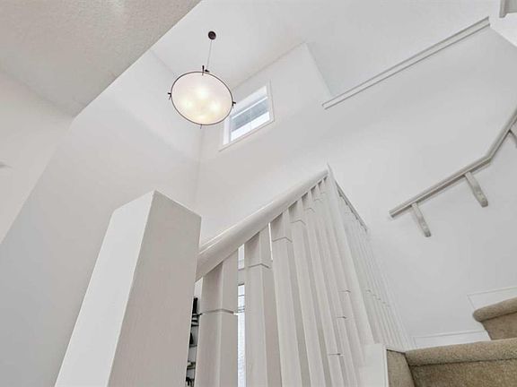 3rd image of 47 E Everbrook Cres SW