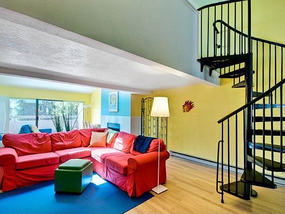 Light and open floor plan. Imported spiral staircase to loft.