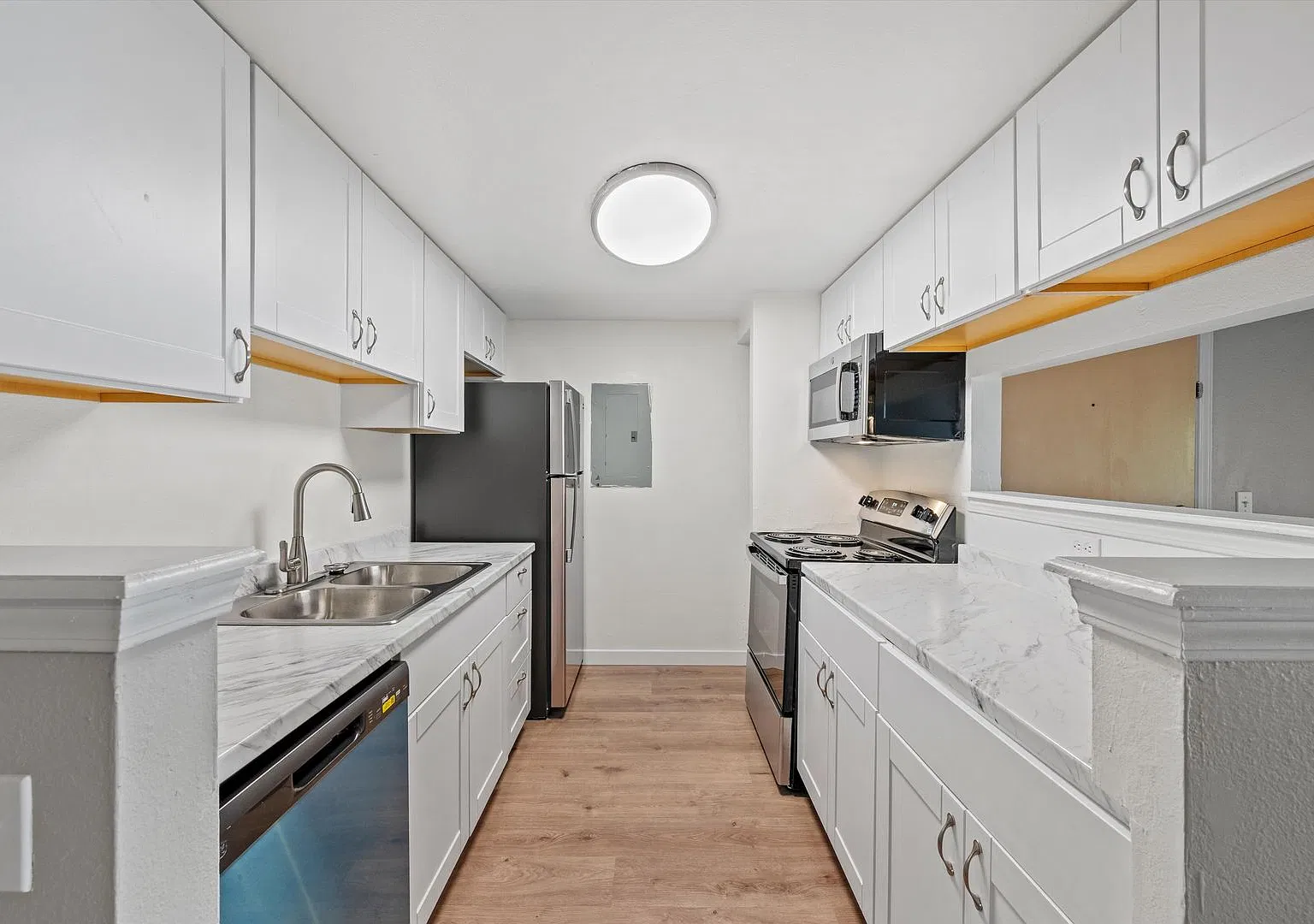 Renovated 3BR/2BA Apartment | New Kitchen + Large Balcony — Photo 4