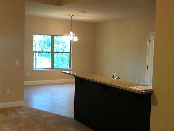 Open floor plan, high ceilings