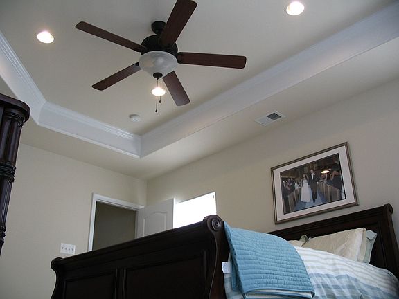 Master bedroom with coffered ceiling