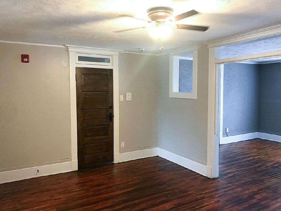 Living Room showing door into apartment