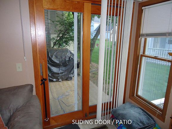 SLIDING DOOR / PATIO OFF OF LIVING ROOM