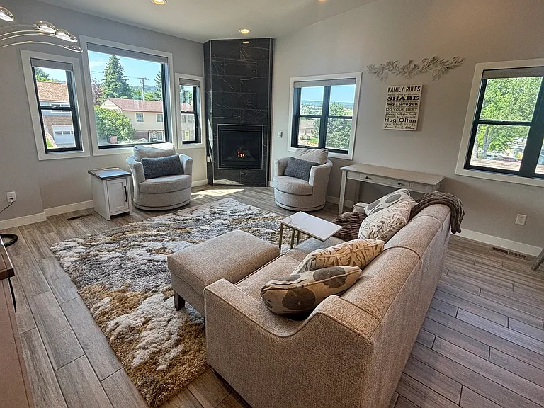 partial living room view with dedicated desk area