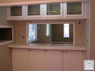 Kitchen pass-through to the formal dining.