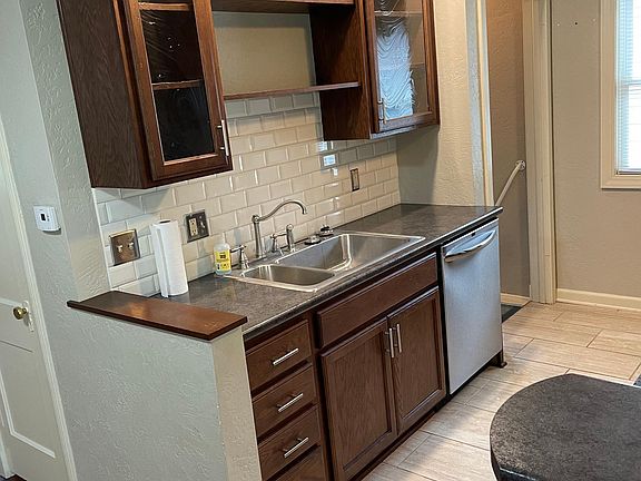 Kitchen. Door to basement.