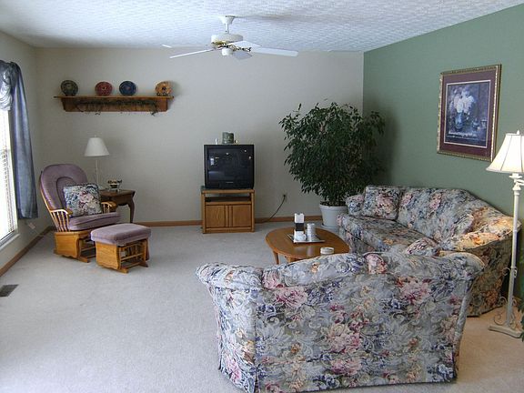 Oversized family room meant for entertaining! Opens to kitchen & backyard.