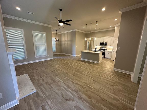 Open living/kitchen/breakfast nook area