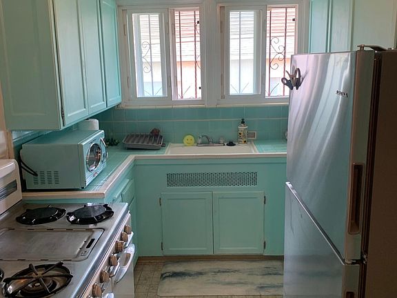 2nd image of 10112 1/2 S 8th Ave #1/2
