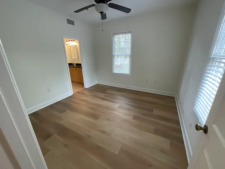 Split bedroom concept. This is the en-suite primary with walk-in closet