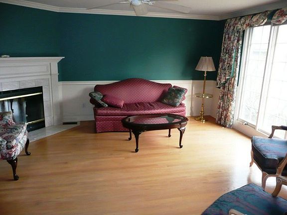 Lovely refinished hardwoods in living,dining,entry,kitchen are easy care, great for allergy worries. Note full length window upgrade to allow southern sun in. Wood burning FP w/custom mantle on inside wall.