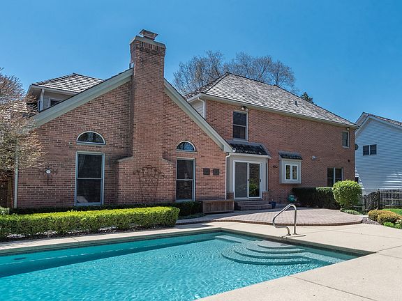 All Concrete 20x40 In Ground Pool with under mount retractable cover.