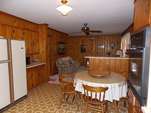 Eat-in kitchen open to den