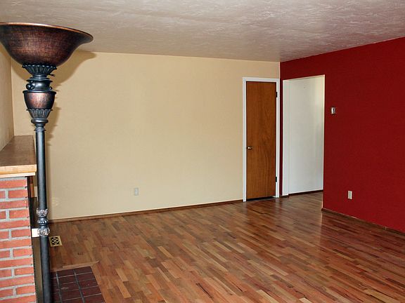 Living Room with refinished original hardwood floors.