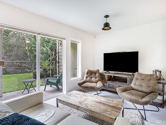 Living room looking out on beautiful, relaxing greenbelt.