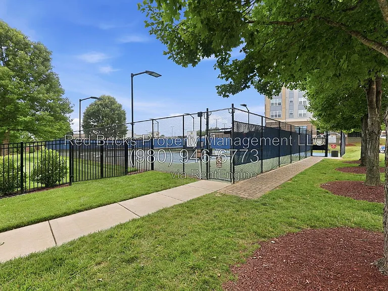 9659 Camberley Ave NW — Photo 45