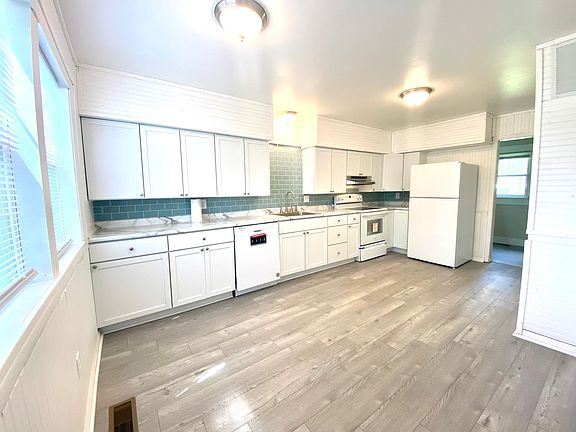 Kitchen from another angle, room for table & chairs....
