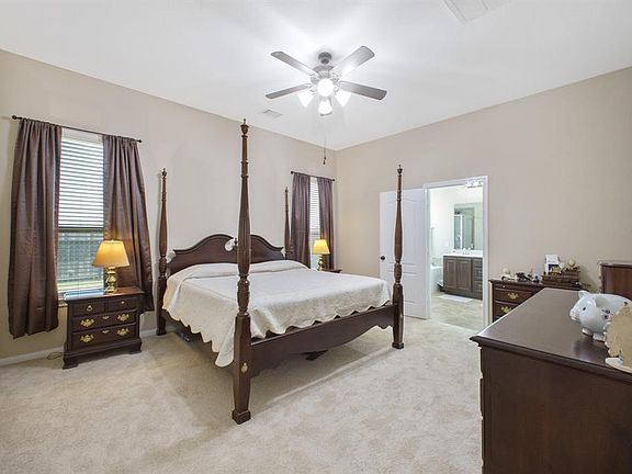 Master located on first floor with ceiling fan, high ceiling-seller replaced the carpet July 2020
