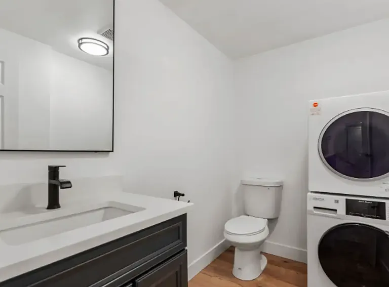 Main floor powder room with laundry.