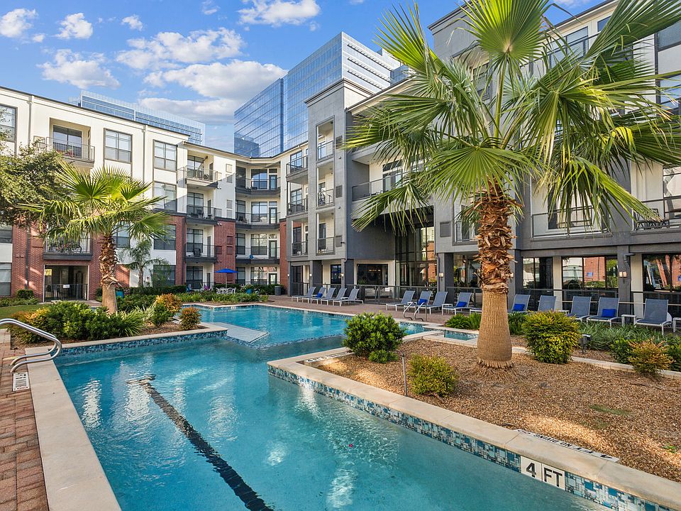 Resort-Inspired Pool with Sun Ledge, Lap Pool, and Waterfall