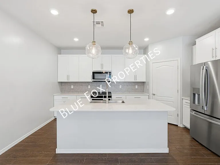8670 N Genoa Ct — Photo 5