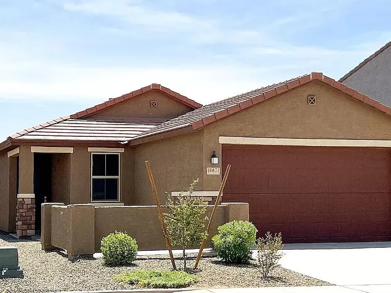 10671 W Harrigan Dr — Photo 1