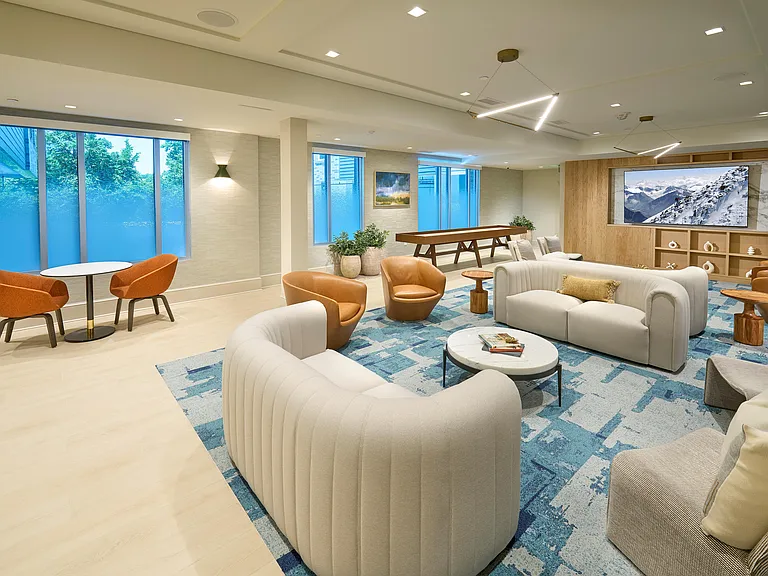 Indigo at McLean Station Phase I Club Room With Shuffleboard, TV, Kitchen & More