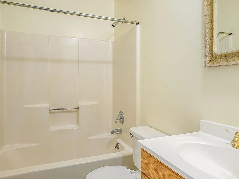 Large bathroom with tub and shower insert!