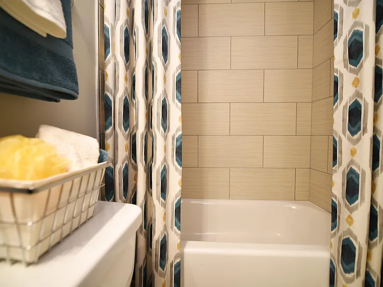 Bright bathroom with bathtub