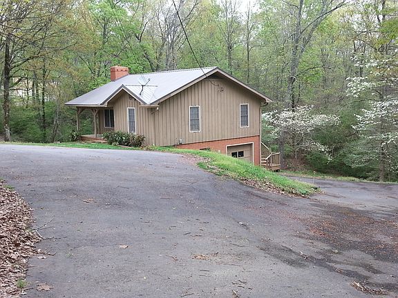 Circle asphalt driveway.