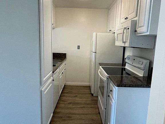 Galley Kitchen with granite countertops