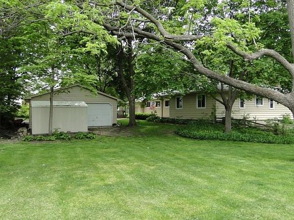 behind detached garage