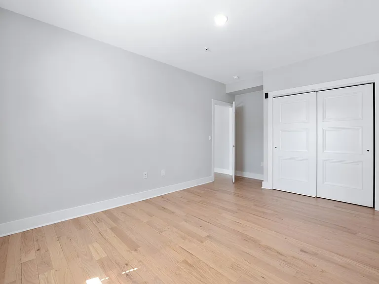 Bedroom with ample closet space